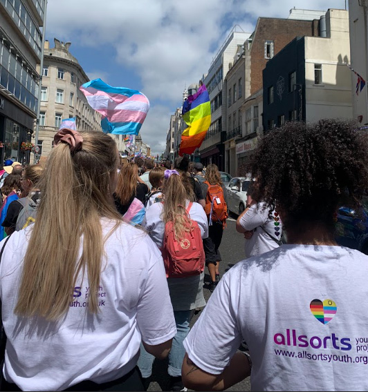 People marching in a pride parade