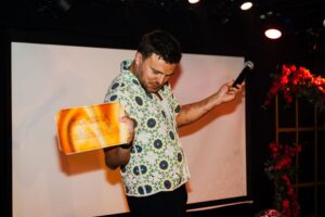 Lee Peart with a Golden Ticket at the Mystery Musicals Day Party at Komedia